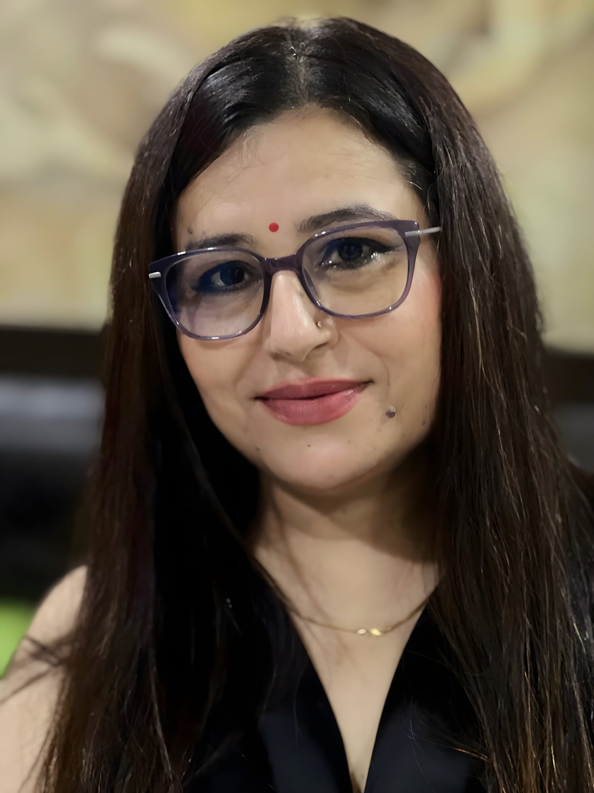 Dr. Mala Singh
